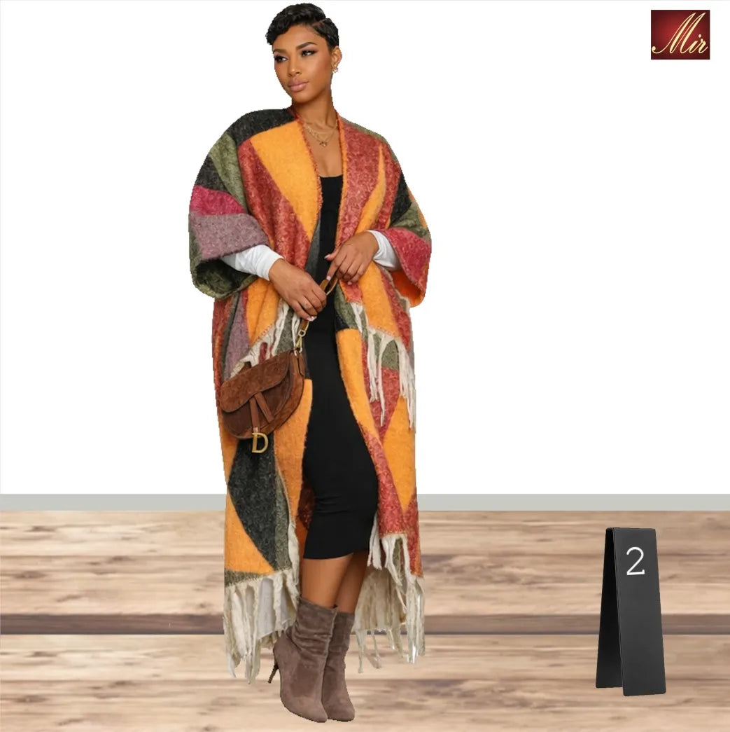 12.21.25 Sweater duster w tassles gold/rust