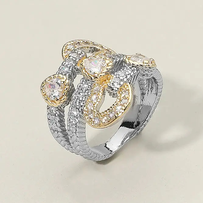 12.7.25 Ring swirl gold/silver rhinestone knot