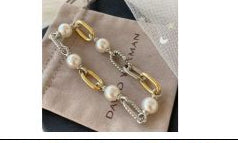 9.3.25 Bracelet DY pearl/gold silver link