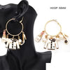 2.5.26 Earring  hoops with designer charms