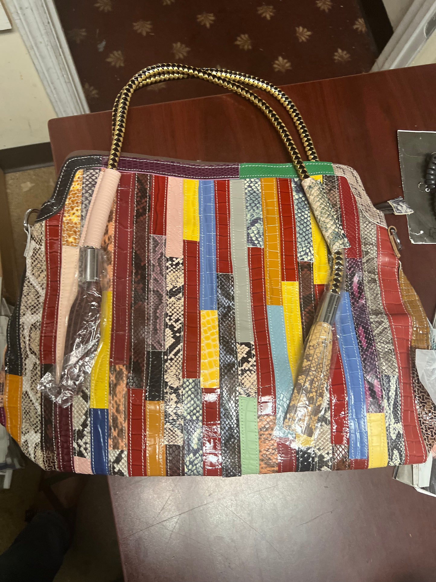 8.13.26 Purse Leather tote w multi pattern w gold braided handle